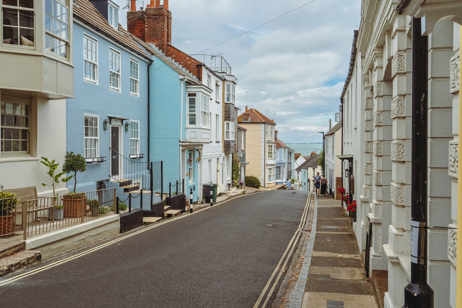 A street of painted terraced houses in Old Portsmouth